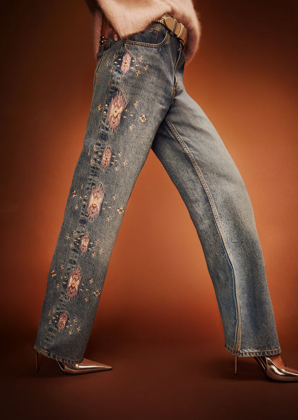 Side view of Vero Embroidered Jean showing large pink diamond embroidery along the outer thigh