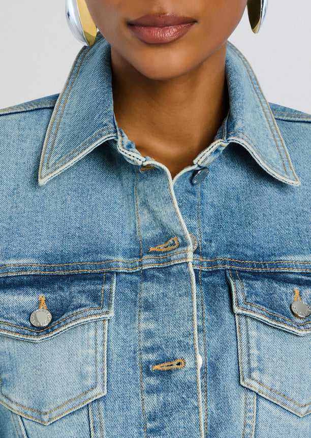 Close up of Aleyni Denim Dress collar with front button in light wash denim