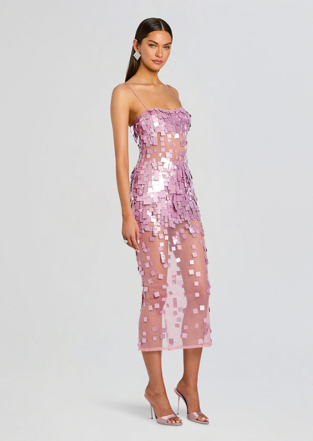 Full length view of a model in a pink Carmin Embellished Dress with thin straps and square sequins