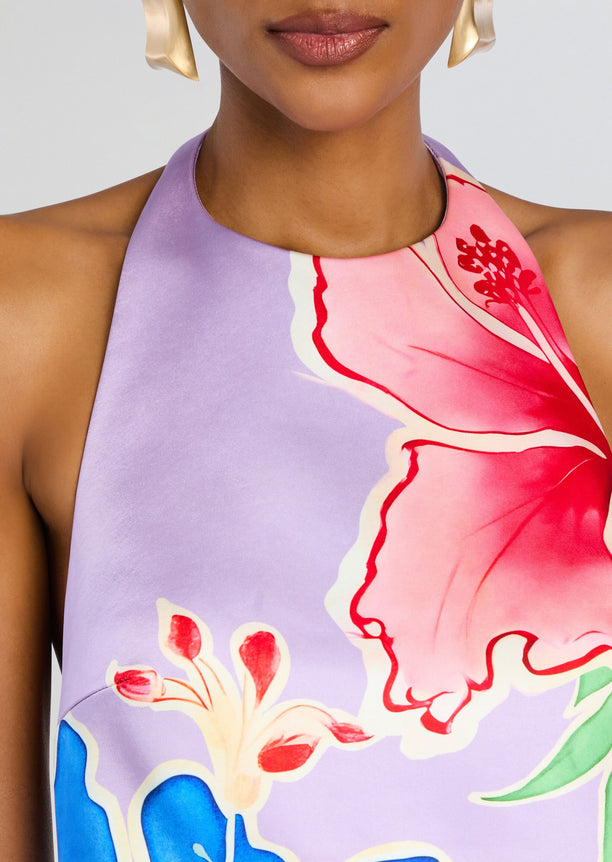 Close-up of the Drexley Dress halter neckline with a pastel lilac base and bold pink floral print.