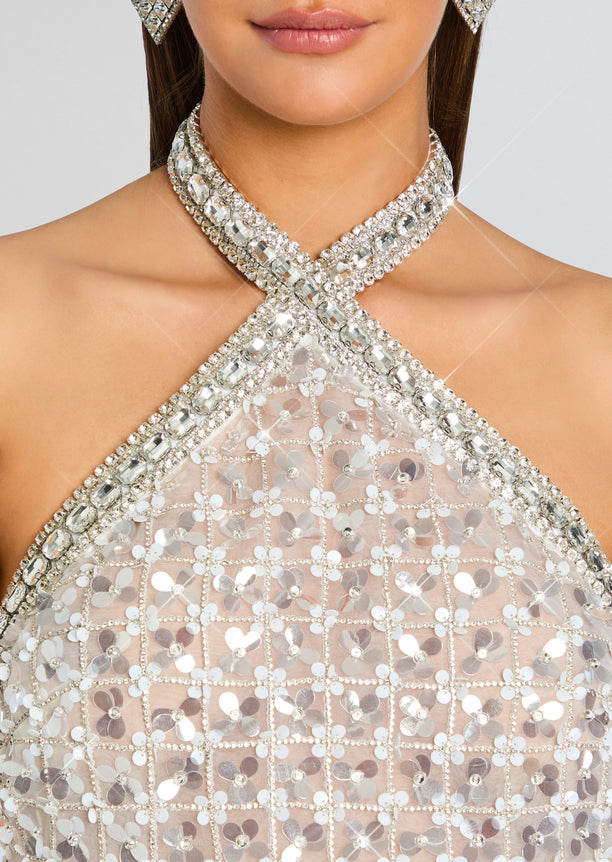 Close up of Janneth Embroidered Dress neckline showing crossing beaded halter and sparkling floral sequins