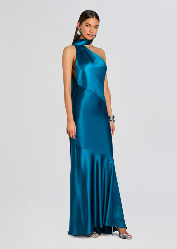 Full-length teal satin Kelsa Dress with asymmetrical neckline and matching neck scarf flowing down the back.