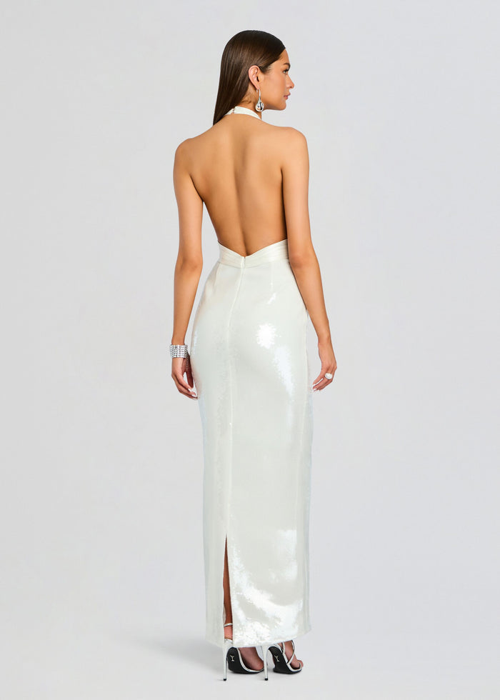 Back view of a white sequin Kelsie dress with halter neckline and back slit media 4 of 5