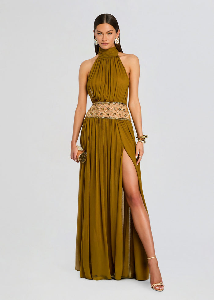 Kreeli Embellished Dress in mustard gold with halter neckline, jeweled waist belt, and a high slit. media 1 of 5
