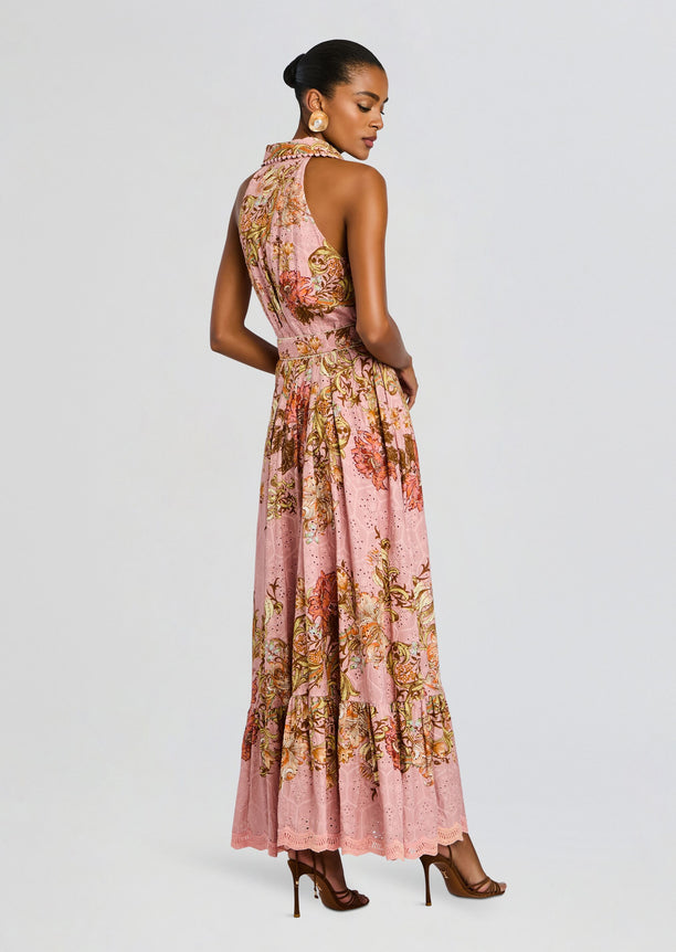Back view of the pink floral Sula Long Shirt Dress with buckle belt showing sleeveless design and tiered hem.