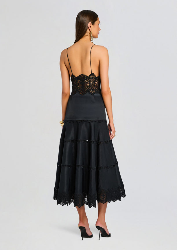 Back view of black Leilani Dress with lace waist panel and slender spaghetti straps.