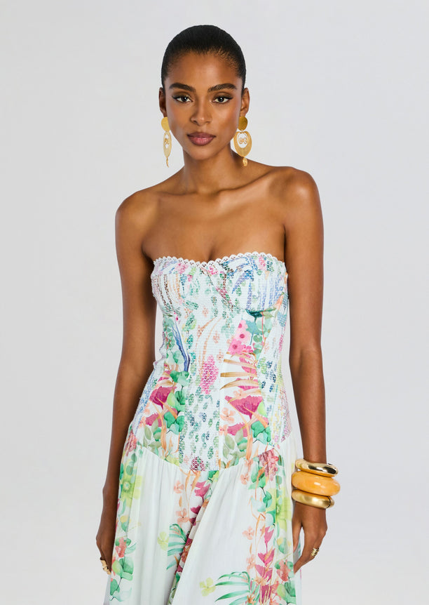 Front view of Illyr Long Dress with a strapless lace trimmed bodice and vibrant garden print.