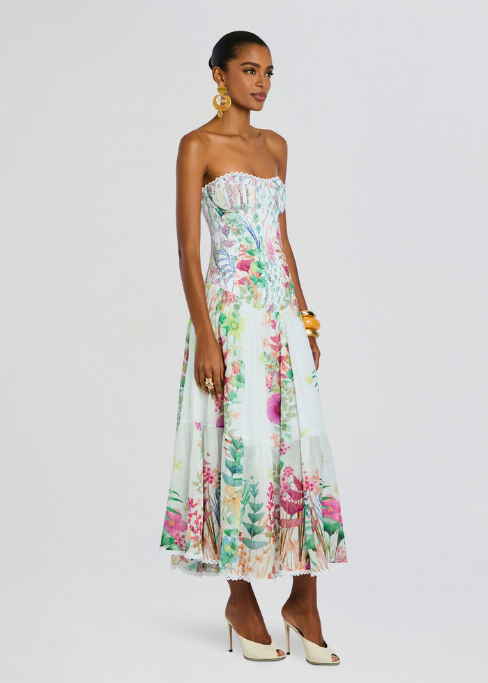 Illyr Long Dress strapless floral maxi worn by a model with scalloped lace trim at the bust. media 3 of 5