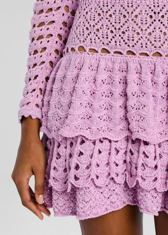 Close up of lilac crochet pattern on the bodice and sleeve of the Lujayn Crochet Dress media 3 of 6