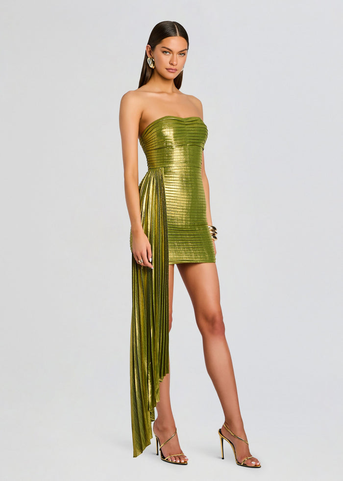 Olive metallic strapless Marcy Dress with horizontal pleats and a long left side draped sash, paired with gold heels. media 3 of 5