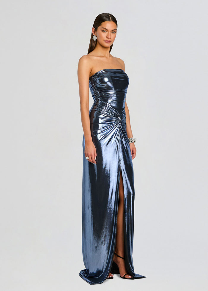 Full length model wearing the Maytal Dress strapless metallic navy gown with ruched bodice and side slit media 3 of 5