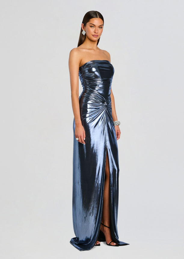 Full length model wearing the Maytal Dress strapless metallic navy gown with ruched bodice and side slit