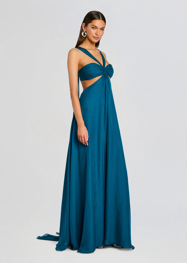 Meira chiffon dress in teal with twisted bodice and side cutouts, floor-length draped skirt.