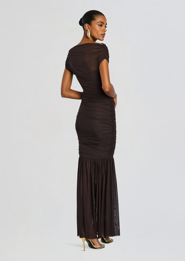 Back view of a chocolate brown Noel Gown with ruched bodice and sheer mermaid hem