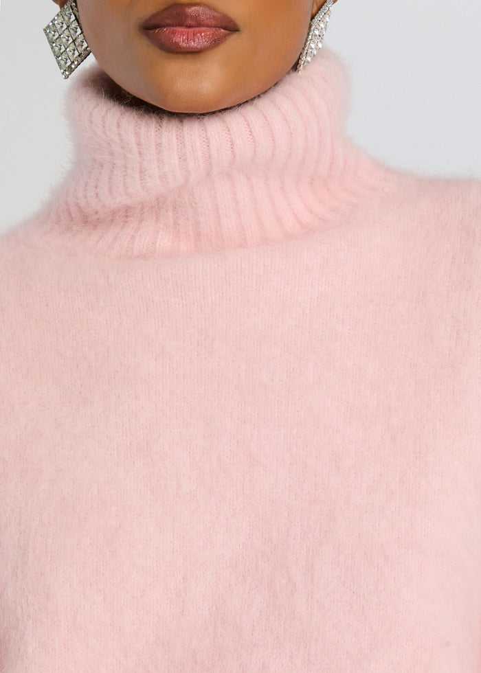 Close up of the pink Olga Sweater showing the fuzzy knit texture and ribbed turtleneck media 3 of 5