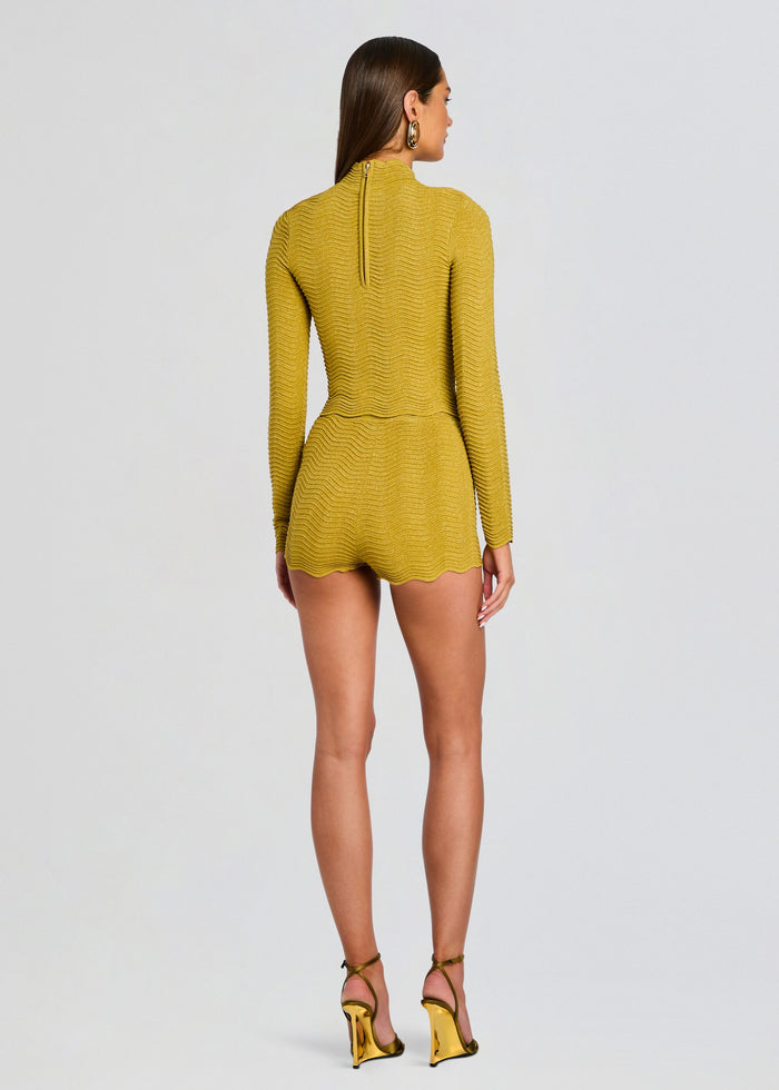 Back view of model in mustard Kait Knit Short set showing a back zip and textured scalloped shorts media 5 of 6