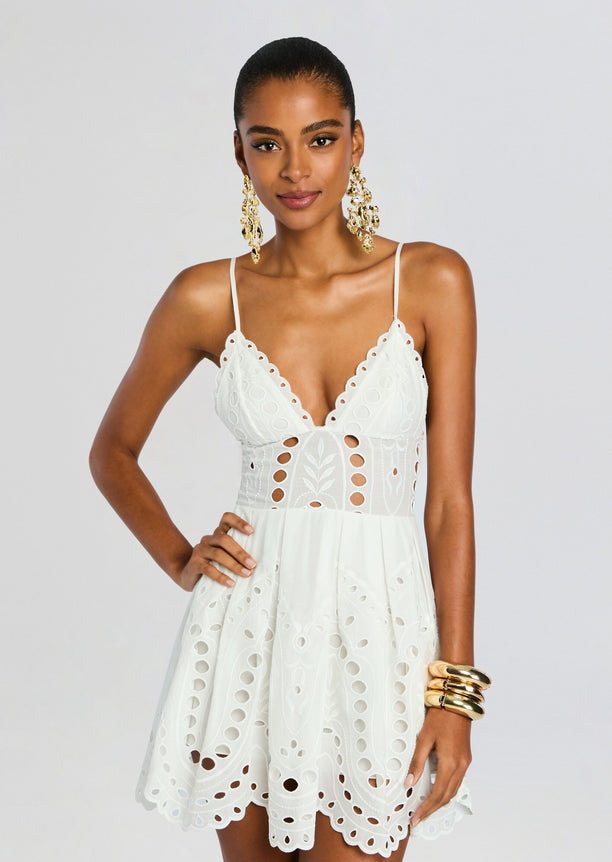White Nix Short Dress with scalloped neckline and cutout eyelet panels on bodice and skirt.