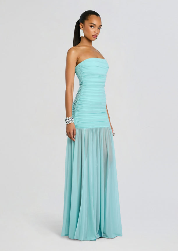 Adele Dress turquoise strapless gown with ruched bodice and a floor-length sheer layered skirt.