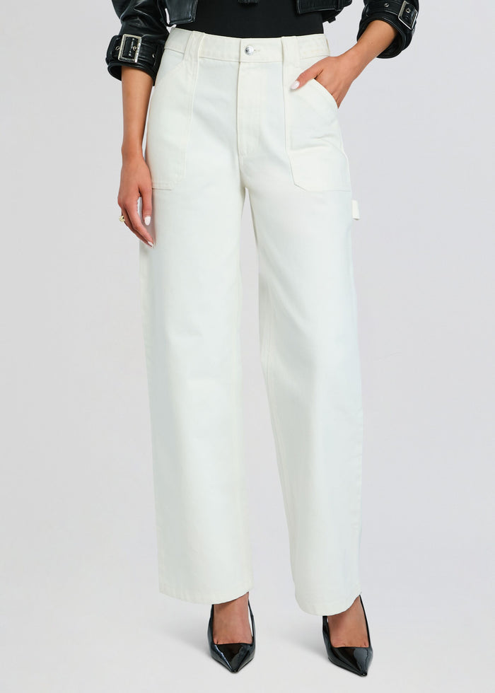 Angelique Denim Pant in ivory white with a high waist and wide legs on a model media 1 of 5