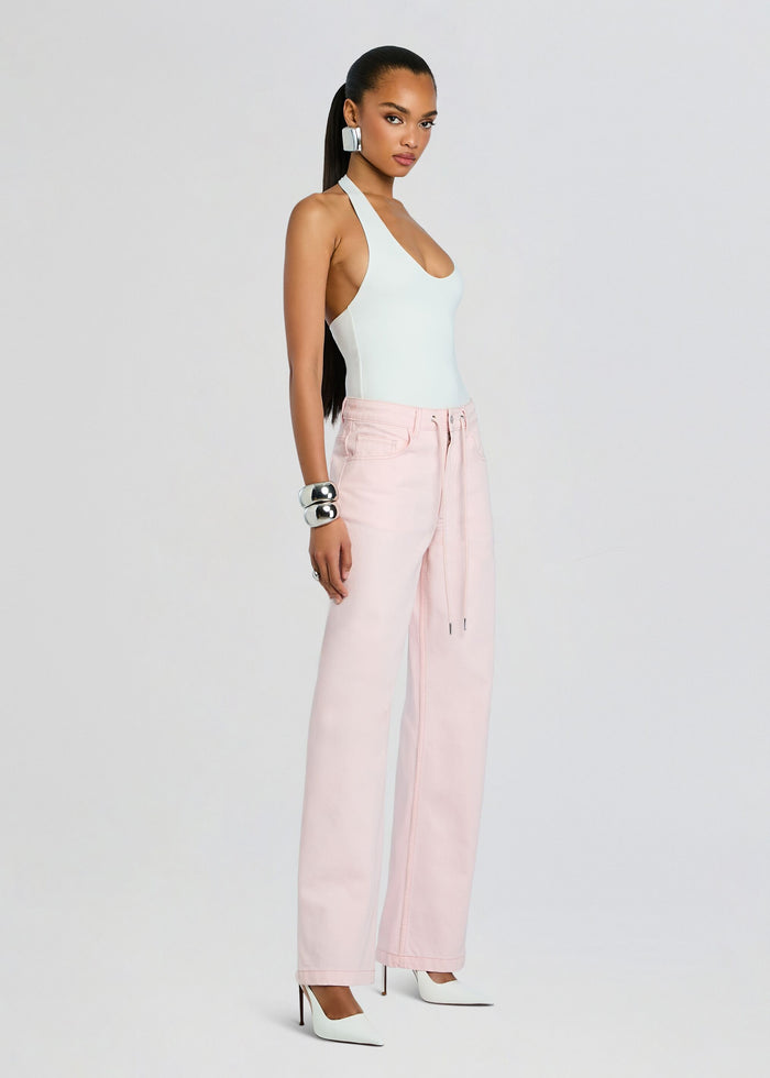 Astrid Denim Pant front view in pale pink wide-leg jeans paired with a light blue halter top media 4 of 5