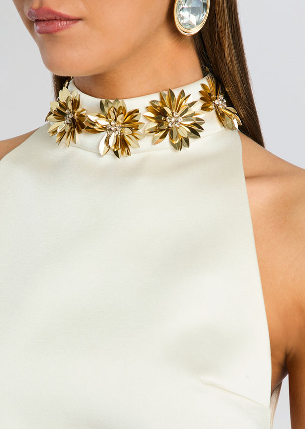 Close up of ivory Giacinta Embellished Dress neckline with gold flower clusters and crystal centers