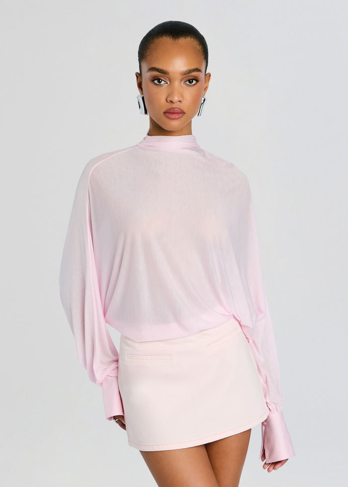 Hawkes Bodysuit in soft pink with a sheer draped top and a pale pink mini skirt media 1 of 5