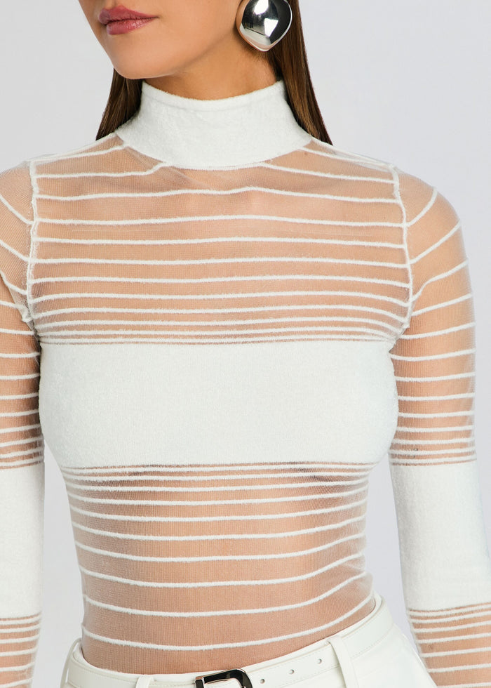 Close-up of Katrine Top showing sheer white striped knit with a solid white bust panel and a high neck media 3 of 5