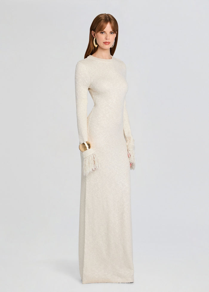 Ivory knit Carina Maxi Dress on a model with long sleeves and fringe cuffs. media 3 of 5