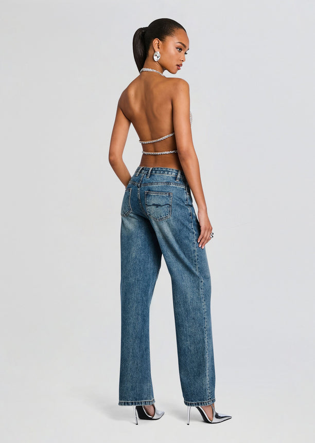 Back view of Delaney Embellished Top revealing dual silver chain straps and back drape.