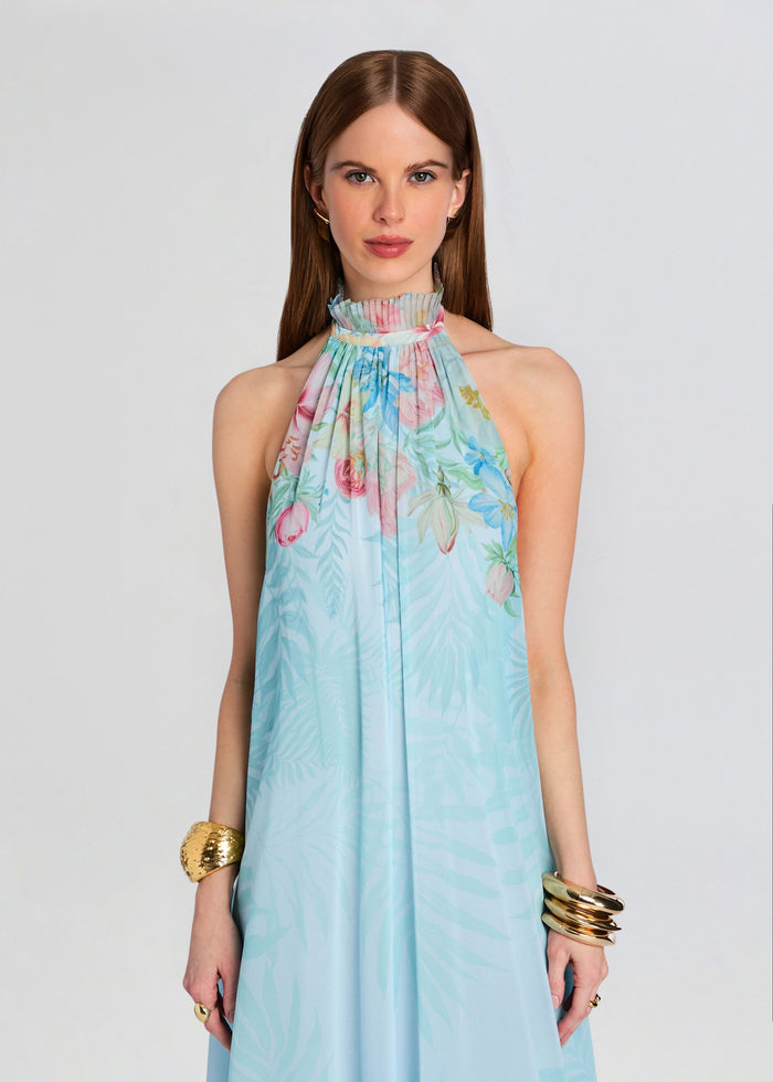 Francy Dress halter neck gown in pale blue tropical floral print on a model. media 6 of 6
