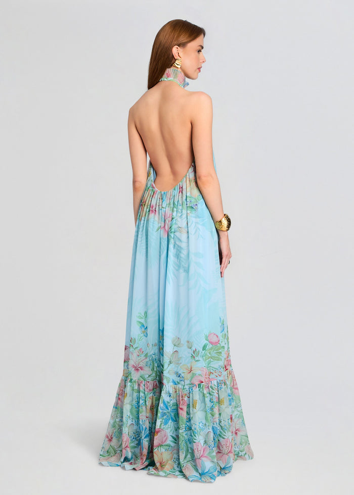 Back view of a pastel blue floral Francy Dress showing an open back and a tiered floral hem media 5 of 6