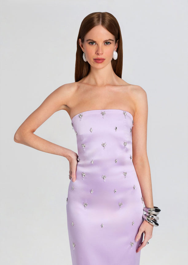Front view of lavender strapless embellished dress with crystal appliqués on a slim silhouette.