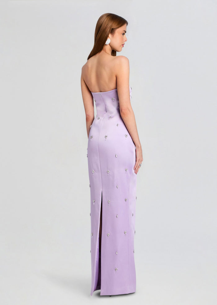 Back view of lavender strapless embellished dress with crystal accents and a back slit. media 4 of 5