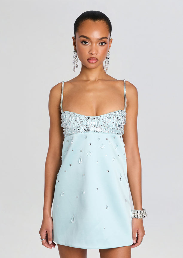 Lorelai Embellished Dress front view with crystal bodice and pale blue skirt model wearing statement earrings