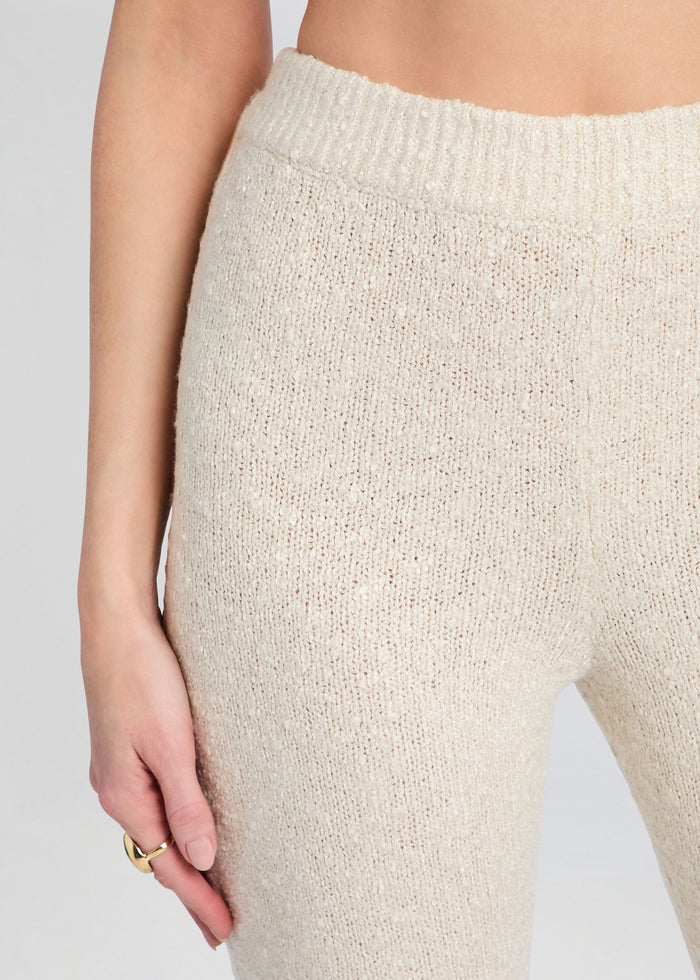 Close-up of cream knit waistband on Zadie Knit Pant showing ribbed edge and textured fabric. media 3 of 5