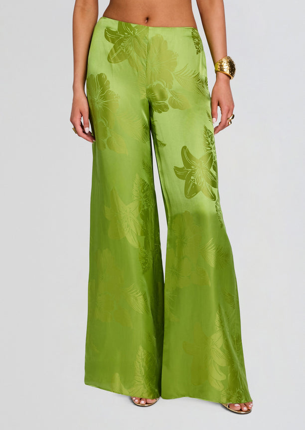 Front view of lime green satin wide-leg Antoinette Pant with tropical leaf print
