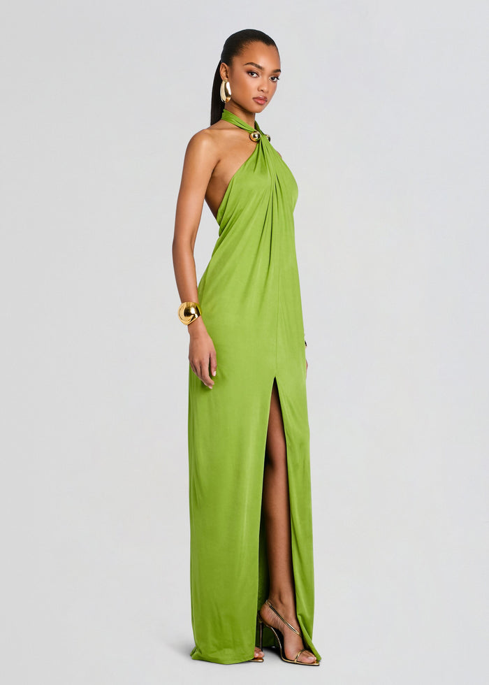 Full length lime green Becs Dress on a model with halter neck open back and thigh-high slit. media 3 of 5