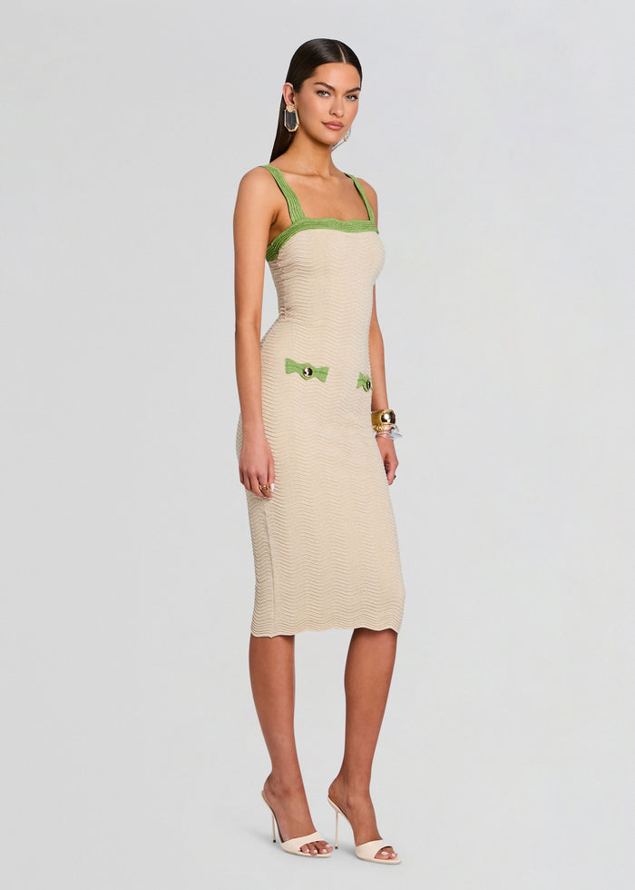 Beige rib knit midi dress with lime green trim along the neckline and straps and bow accents. media 3 of 5