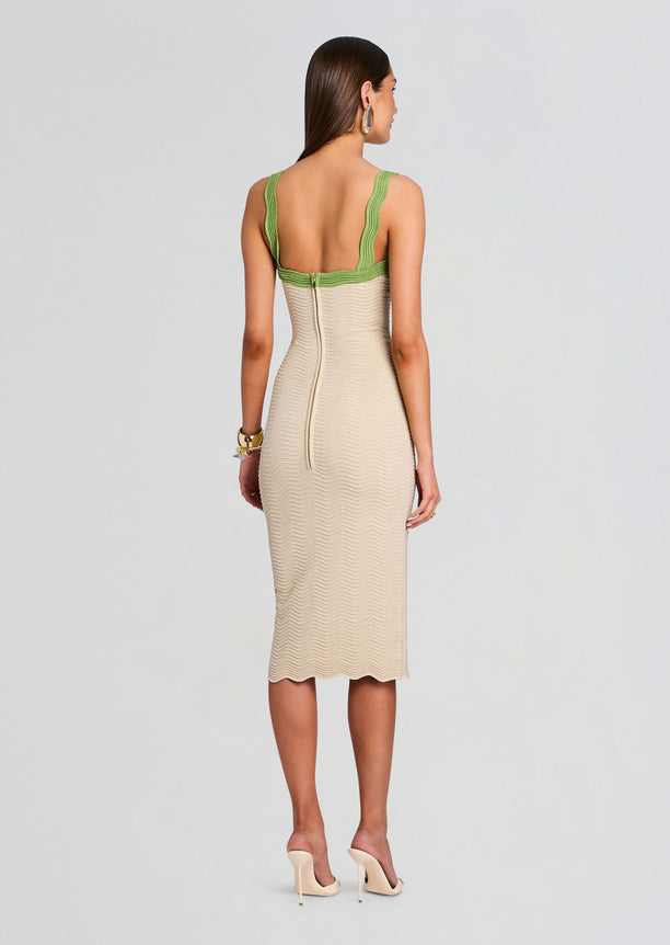 Back view of beige rib knit midi dress with lime green trim at the straps and neckline and a center back zipper.