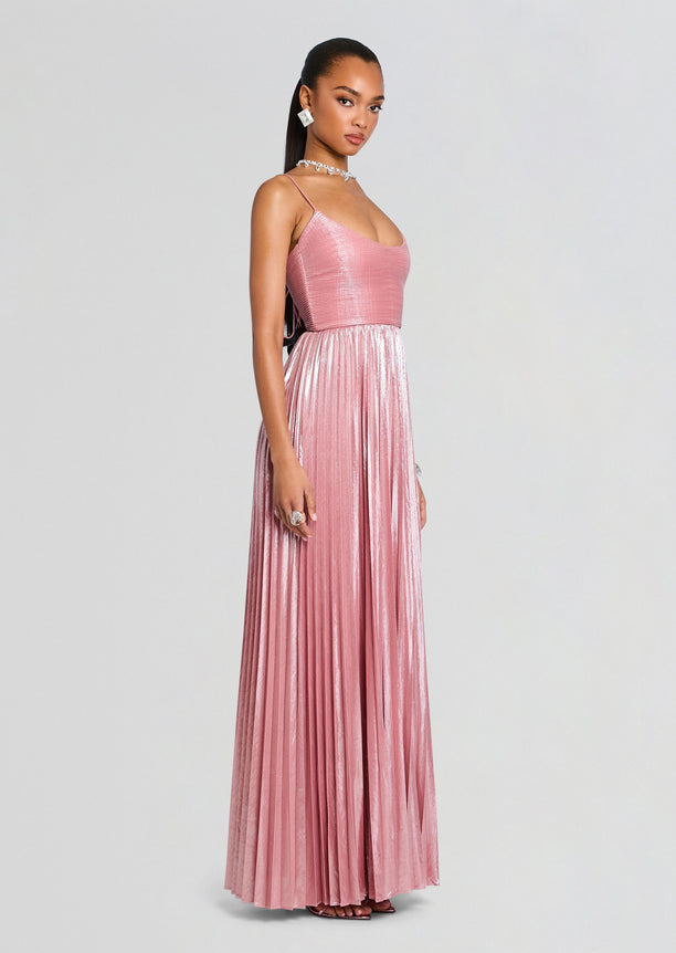 Side view of the pink metallic Rhosyn Dress on a model with jewelry