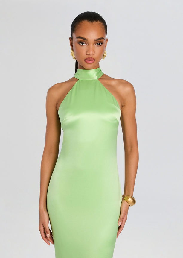 Front view of a lime green satin gown with a high halter neckline and a back with multiple thin straps.