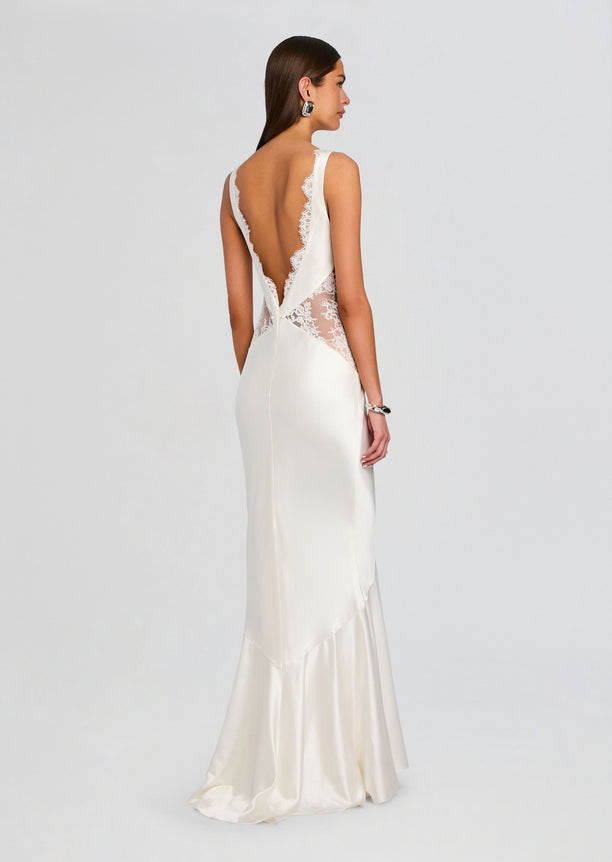 Back view of white satin Analuisa Lace Dress with V open back and lace trim along edges and train