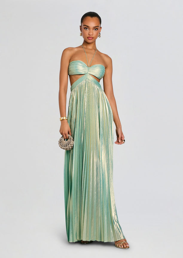 Keira Dress mint metallic strapless gown with twisted bodice and pleated skirt, model holding a woven clutch