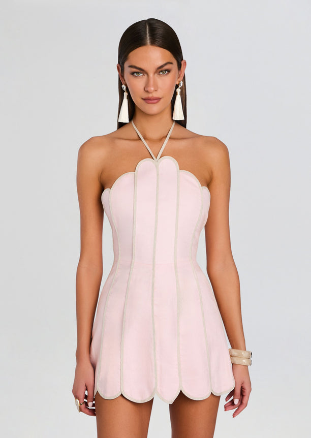 Front view of pale pink Lenny Dress with scalloped bodice and scalloped hem and vertical seams.