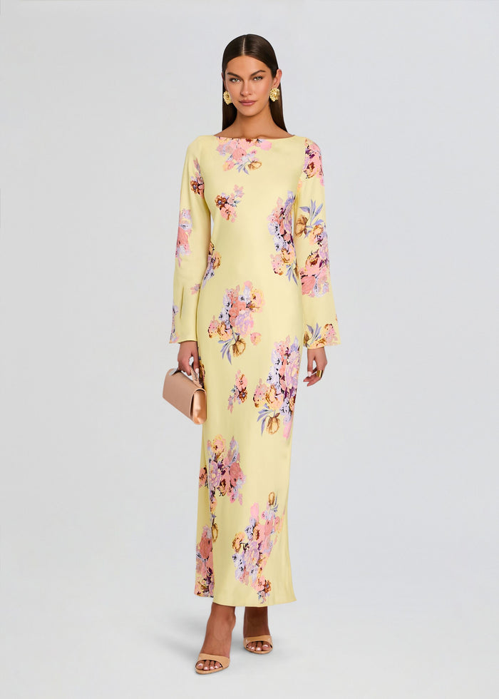 Kysha Long Bias Dress in pale yellow floral print with long sleeves worn by a model media 1 of 5