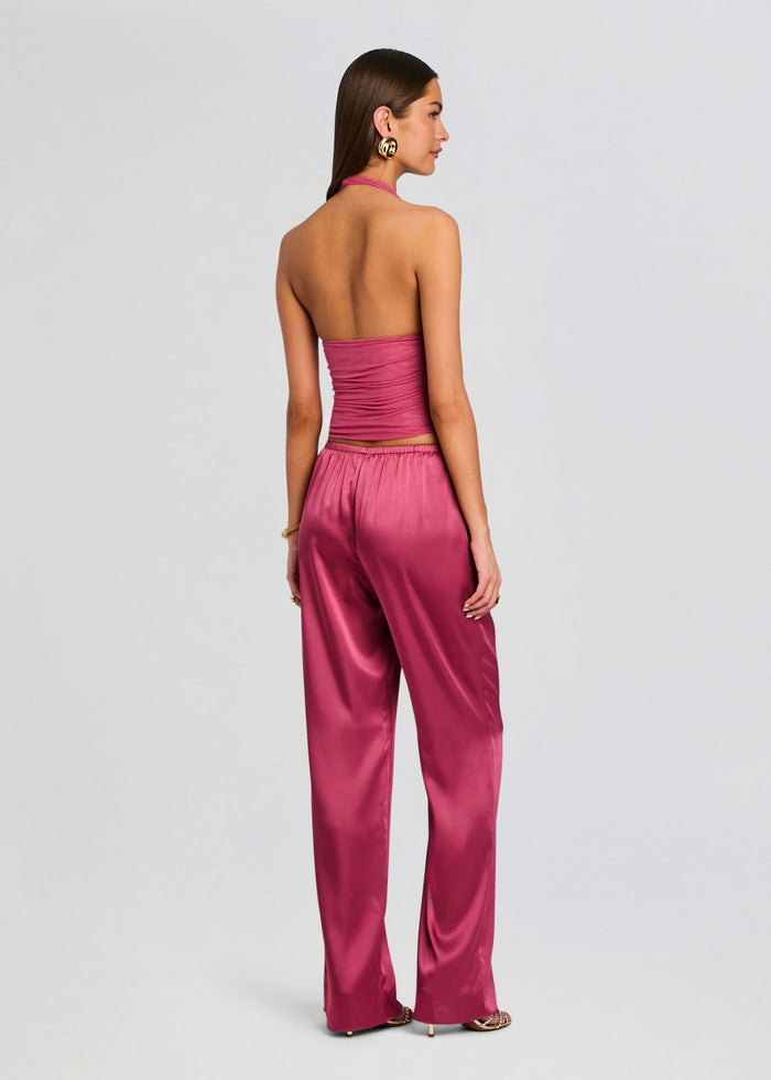 Back view of the Lillian Satin Pant set showing a pink halter top and satin wide leg pants media 5 of 5