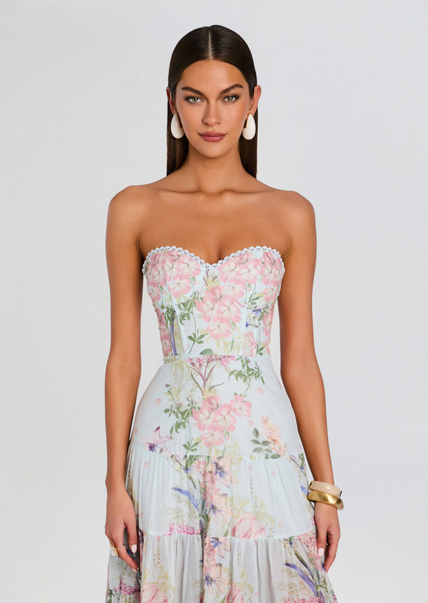 Front view of Danny Long Dress, pastel floral strapless maxi with scalloped neckline worn by a model.