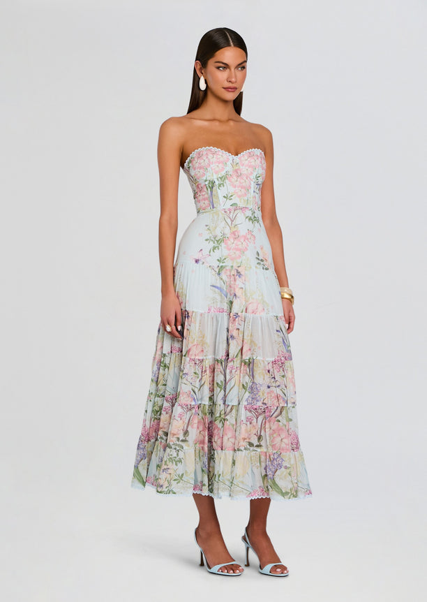 Front view of Danny Long Dress, a pastel floral strapless maxi with lace scalloped neckline and tiered skirt.