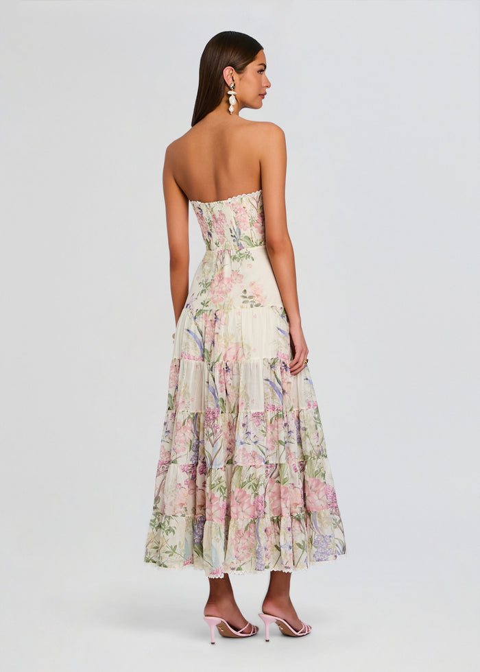 Back view of a strapless floral long dress with a smocked bodice and tiered skirt media 4 of 5