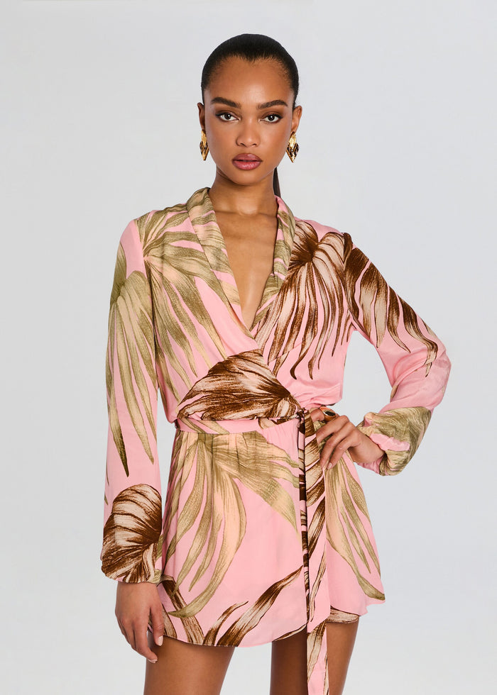 Model wearing pink palm leaf print mini dress with a detachable belt tied at the waist media 5 of 5